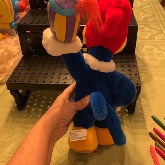 Charming Nostalgia: Woody Woodpecker Plush Collectible Cartoon Character.
